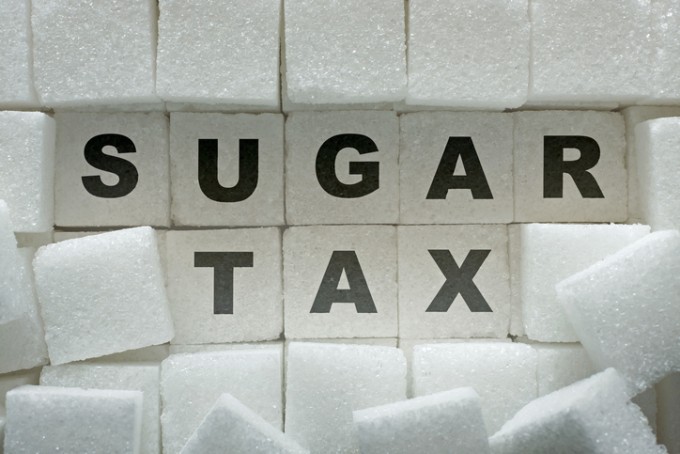 Sugar cubes and "sugar tax" inscription